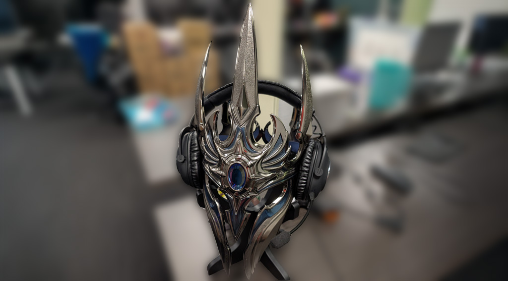Photograph of a silvery crown wearing a typical headset